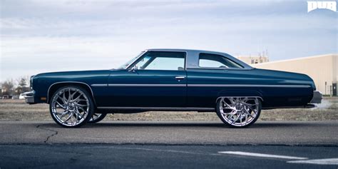 Ride High In This Chevy Impala On Massive Dub Wheels