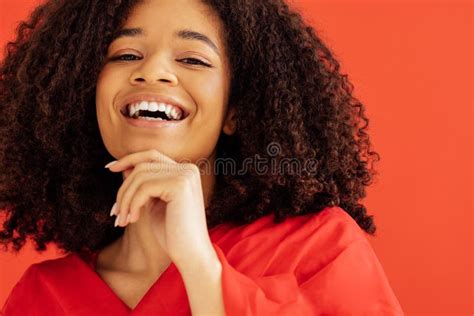 Close Up Of Portrait Of Cheerful Beautiful Young Girl With Afro
