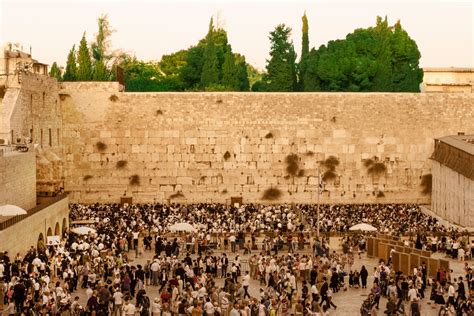 Praying At The Wailing Wall In Jerusalem Isramisrael