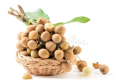 Fresh Longan Fruit With Leaves In Bamboo Basket Isolated Stock Image