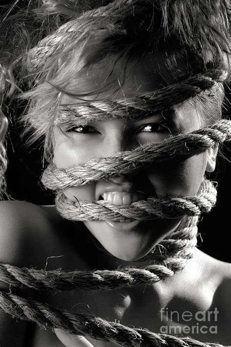 Young Expressive Woman Tied In Ropes Photograph By Oleksiy
