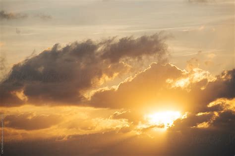 Sun Hiding Behind The Clouds By Stocksy Contributor Cactus Creative