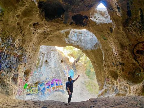 Hike To A Mesmerizing Sandstone Cave With Panoramic Views Of Santa
