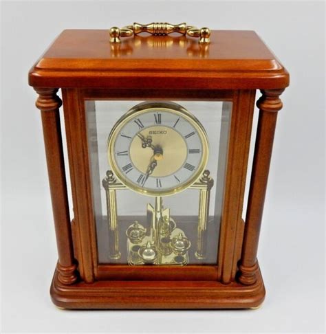 Seiko Wooden Mantel Clock With Rotating Pendulum Qxg332blh Battery