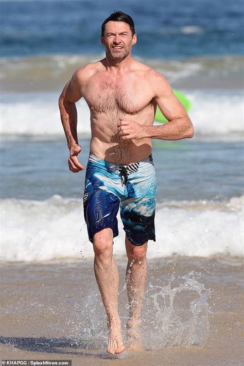 Hugh Jackman Shows Off His Incredible Physique As He Goes Shirtless For A Dip At Chilly Bondi