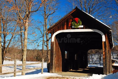 Snow Covered Bridge In New England Town Stock Image