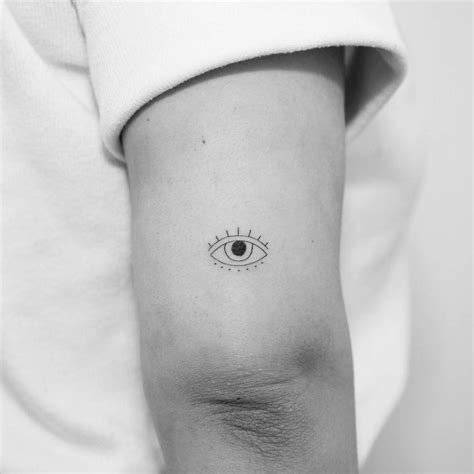 Minimalist Evil Eye Tattoo On The Tricep