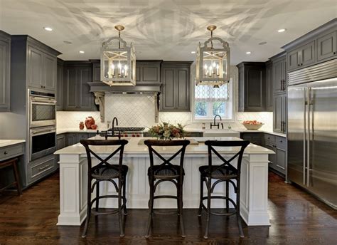 The lighter wood for your kitchen cabinets provides a bright accent to the dark marble countertops, creating the ideal serene ambiance for a home. 30 Classy Projects With Dark Kitchen Cabinets | Home ...