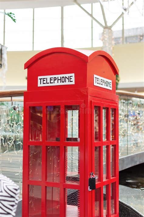 London Style Red Public Telephone Booth Indoor On Christmas Time Stock