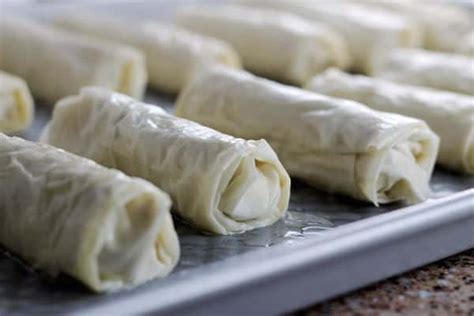 They're both known for layers of dough. Phyllo Dough Meat Rolls | The Mediterranean Dish