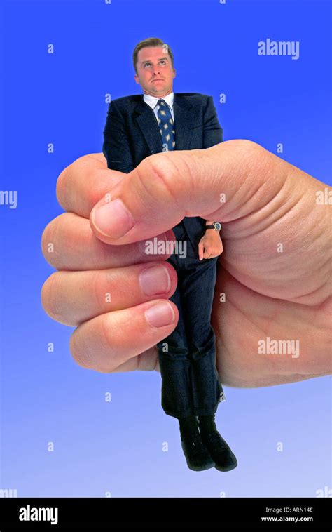 Businessman Body Squeezed By Hand Stock Photo Alamy