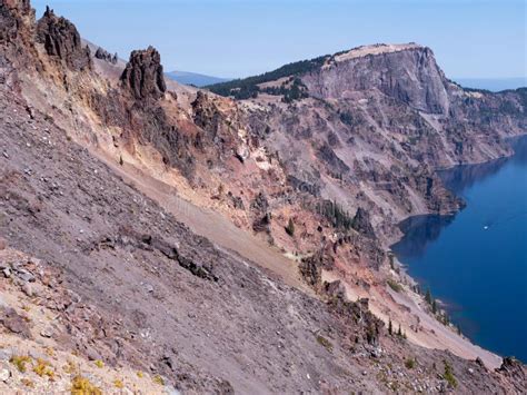 Steep Cliff And The Blue Crater Lake Oregon Stock Image Image Of Sign