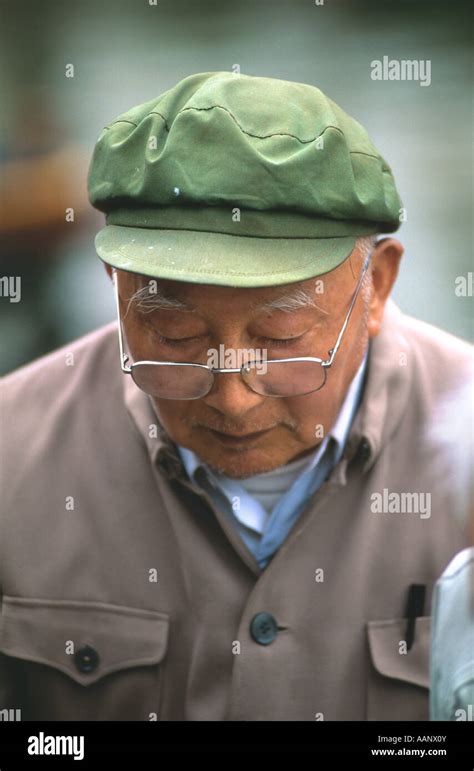Chinese Senior With Traditional Mao Cap Hi Res Stock Photography And