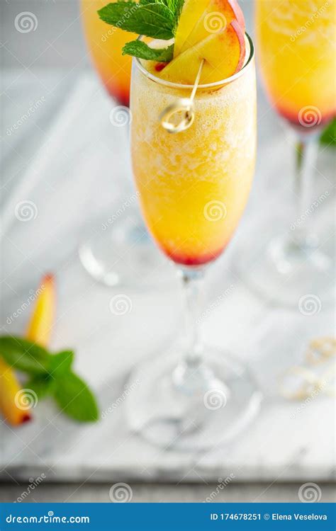 Summertime Peach Mimosas Or Bellinis Stock Image Image Of Bubbly