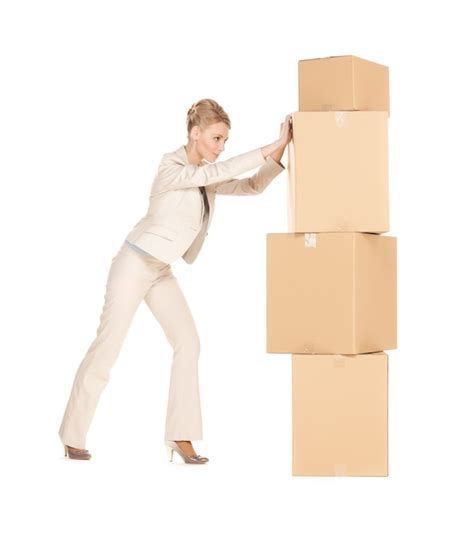 premium photo picture of attractive businesswoman moving big boxes