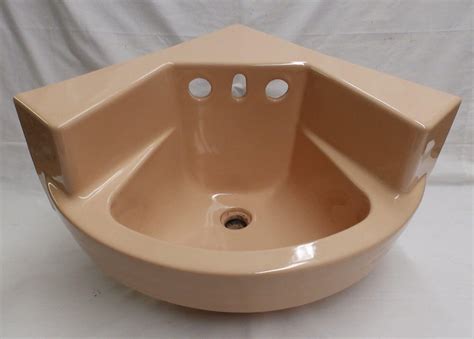 My corner sink design is a very complicated sink to build, but our expert metal artisans are up to the challenge! Odd & wonderful vintage corner bathroom sink