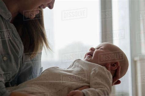 Caucasian Mother Admiring Baby Stock Photo Dissolve