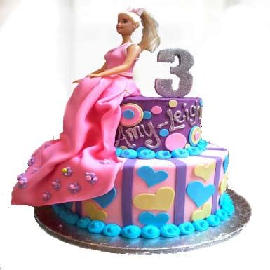 The year my daughter turned 6 she was really into barbies. Order Enchant Barbie Cake in 2 Tier Online | Fresh & Tasty - CakenGifts