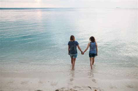 Two Girlfriends Hugging Each Other On The Beach Stock Image Image Of Horizontal Caucasian