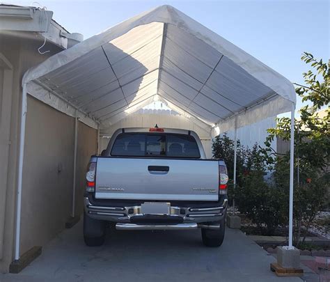 Using galvanized steel, the frame of our car canopy is tough and durable against the elements for extension kit extends shade coverage from a 10 ft. 10 Ft. x 20 Ft. Portable Car Canopy | Car canopy, Car shed ...
