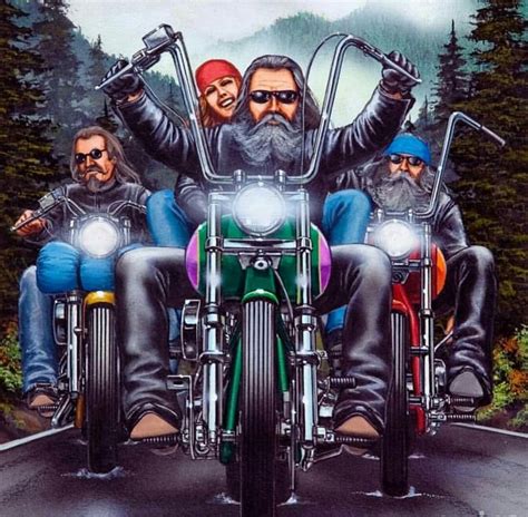 Three Bikers Are Riding Down The Road On Their Motorcycles With Trees