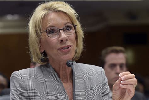 betsy devos civil rights chief apologizes for remarks about college sex assaults