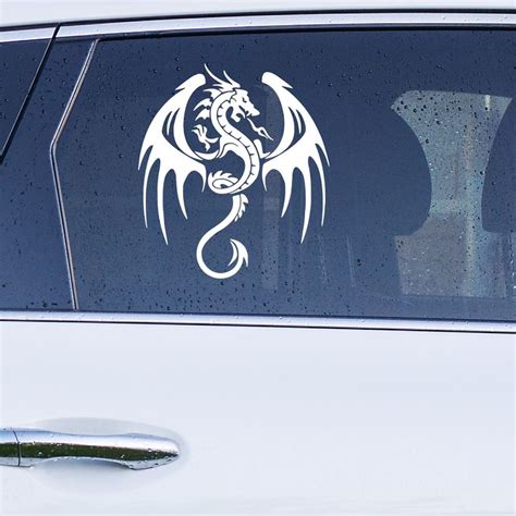 A White Dragon Decal On The Side Of A Car