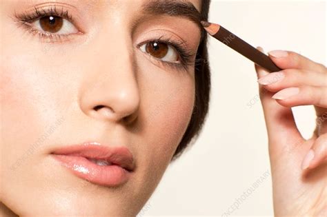 Woman Applying Eyebrow Pencil Stock Image F0212341 Science Photo