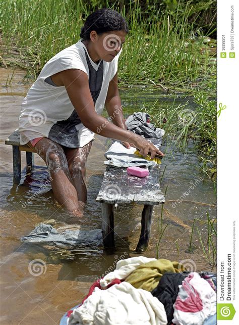 Brazilian Woman Washing Clothes In River Brazil Editorial