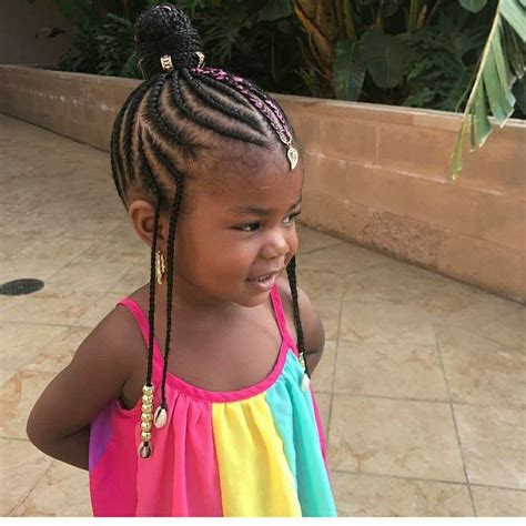 Cornrow hair into a high ponytail and braid loose hair into a fishtail braid adding texturizing hair spray to help hold the braid. Children's braids | All Things Hair! | Pinterest | Kid ...