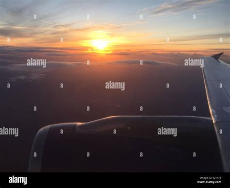 Sunset Through Aircraft Cabin Window Stock Photo Alamy