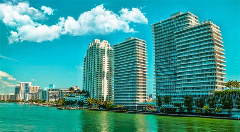 819515 4k Usa Houses Ocean Sky Coast Miami Florida Clouds