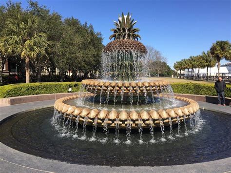 A Pineapple Fountain In The Middle Of A Park