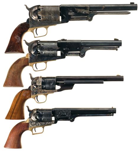 Four Italian Reproduction Colt Revolvers A Walker Percussion Revolver
