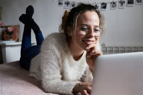 Girl Using Laptop Home By Stocksy Contributor Ivan Gener Stocksy