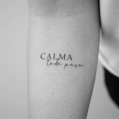Calma Todo Pasa Lettering Tattoo Located On The