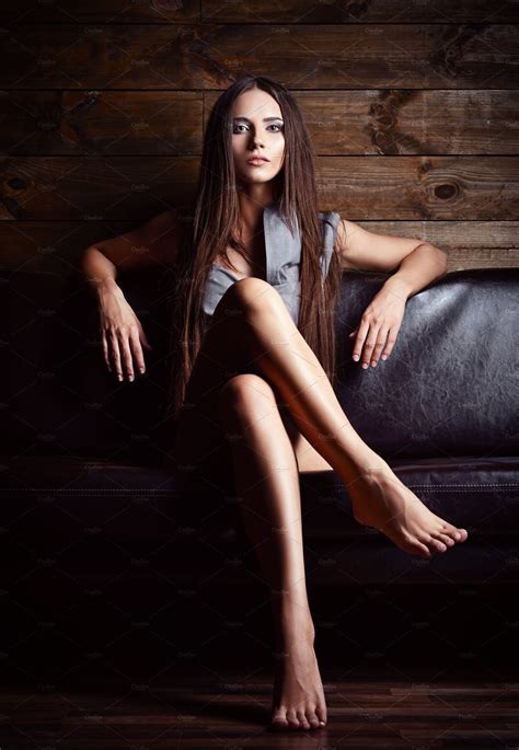 Beautiful Young Girl Sitting On Sofa High Quality People Images ~ Creative Market