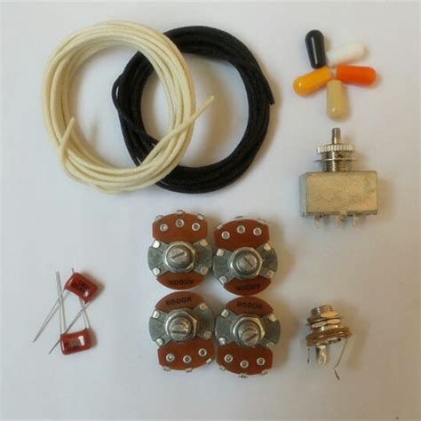 Take a snap of the old wiring just in case anything goes wrong. Wiring Kit,for Les Paul LP custom,Alpha A / B 500K pot,3 Way Box Style Switch,0.023 capacitor,Wire