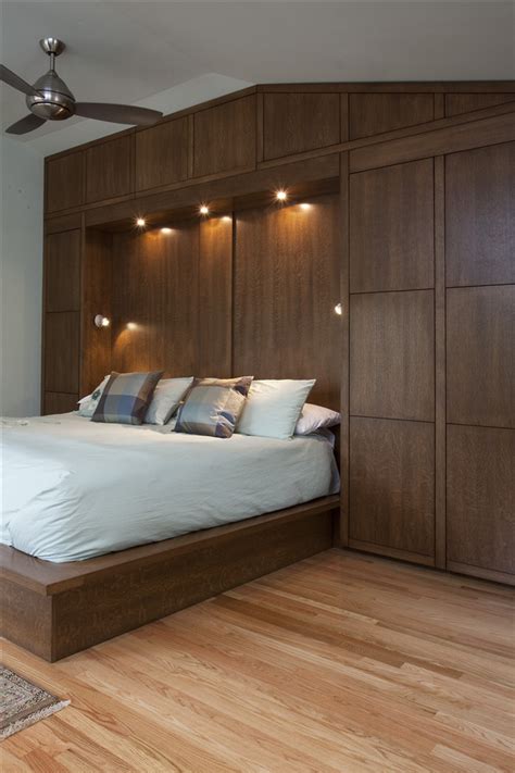 Bedwall With Built In Cabinet Surround And Hidden Door Modern Bedroom