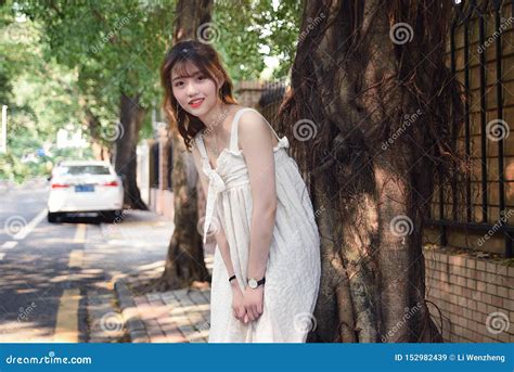 Beautiful And Lovely Asian Girl Shows Her Youth In The Park Stock Image Image Of