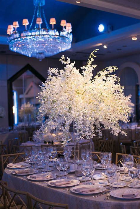 Large White Floral Centerpiece In Glass Vase Floral Centerpieces