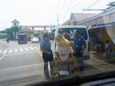 Bikini Wearing Tourist Pulled Over By Police In The Philippines The Courier Mail
