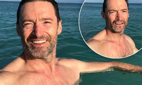 Hugh Jackman Reveals He Double Dipped Himself In Sunscreen As He Strips Off For Dip In The Ocean