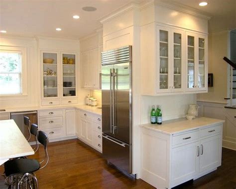 2021 kitchen design puts the kitchen in the heart of the home. Cabinetry | Custom kitchen cabinets, U shaped kitchen, Home appliance store