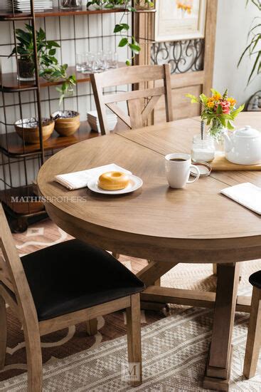 Expandable dining tables are always good to have in the house. Casual 66" Expandable Round Pedestal Table in Medium Brown ...