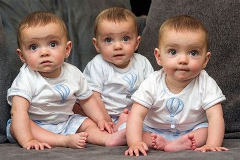 aww these cute identical triplets are one in 200 million as they were born at the same time