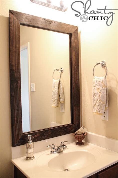 An antique design frame would work well for a classic bathroom theme. Cheap and Easy Way to Update a Bathroom! - Shanty 2 Chic