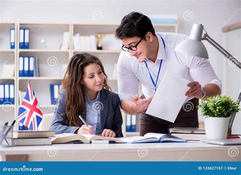 The Teacher Explaining To Student At Language Training Stock Image