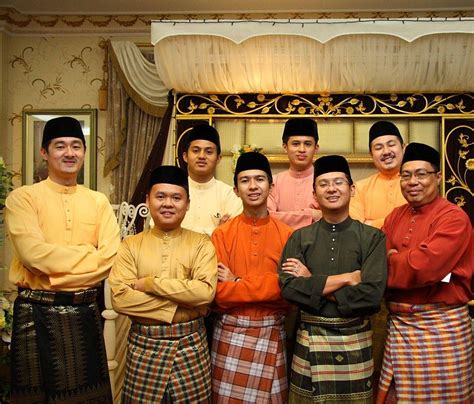 A Typical Baju Melayu Assemble In Brunei Worn Together With A Songket
