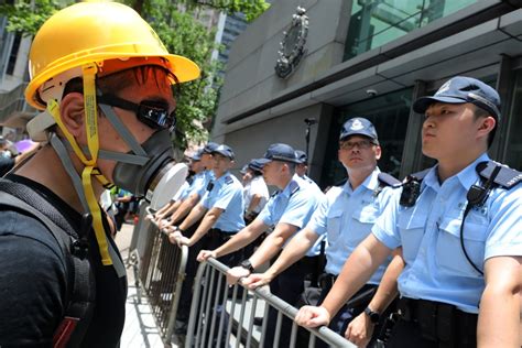 Flipboard Police Chief Defends Restrained Approach To Hong Kong Anti